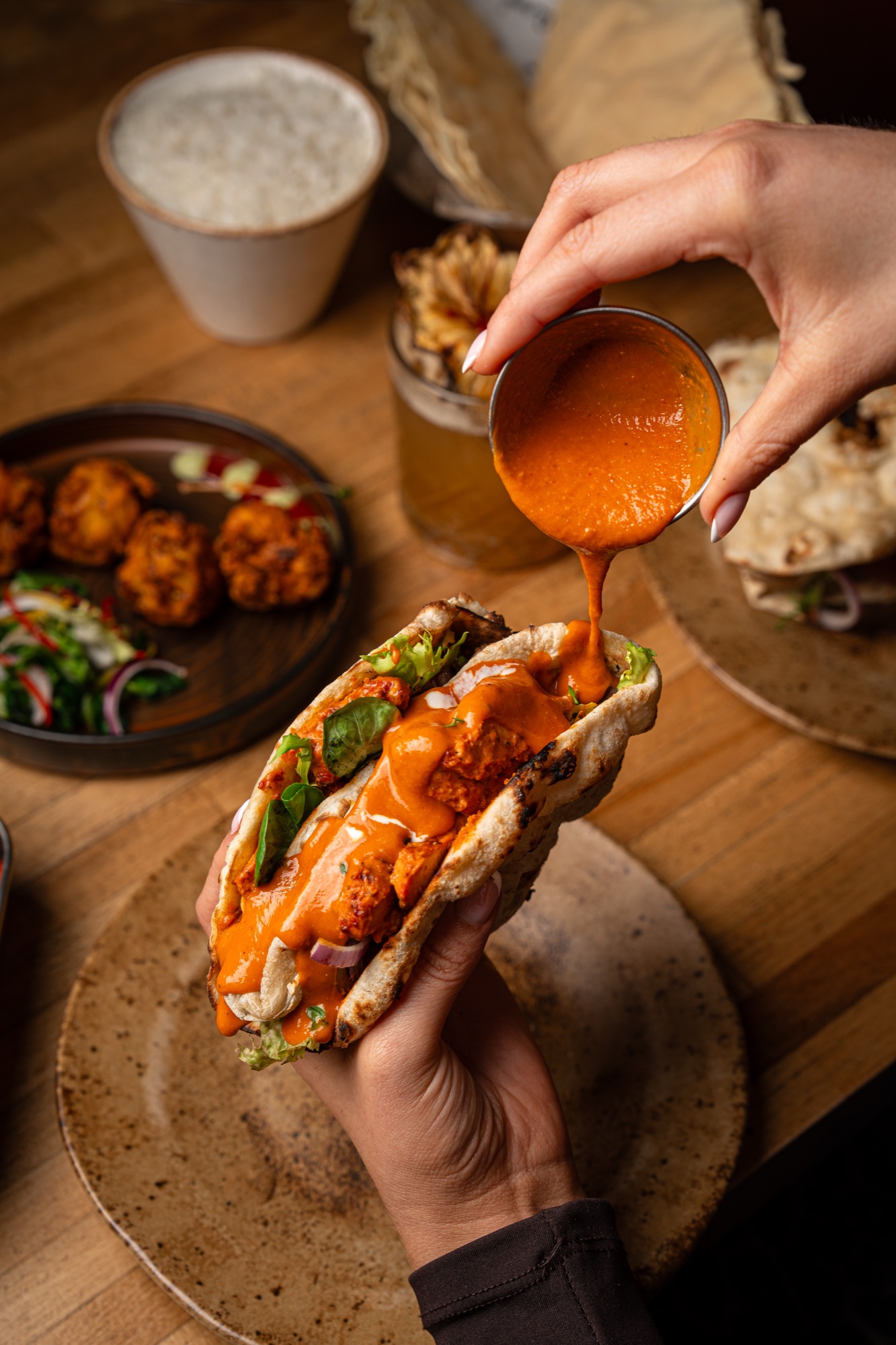 Butter chicken naan sandwich, our signature street-food twist