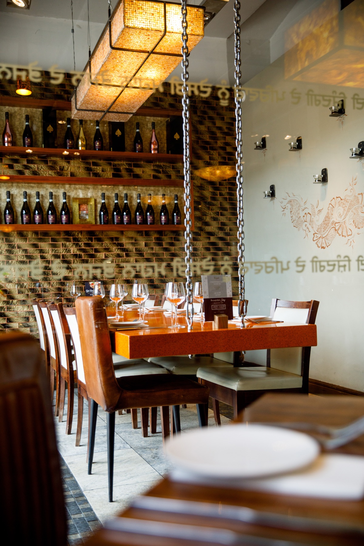Wine wall and Punjabi script detail