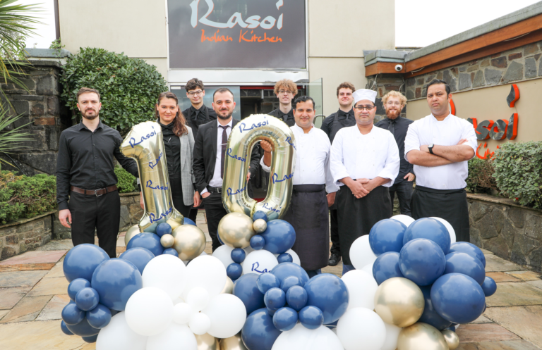 Rasoi staff outside outside restaurant celebrating 10 year anniversary